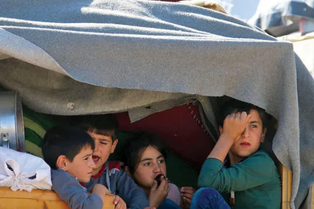 850 نازحاً في عرسال يعودون إلى سوريا