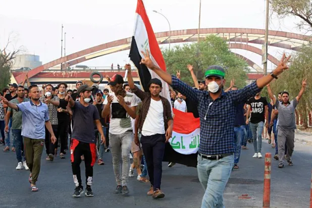 محتجون في العراق (أ.ب)