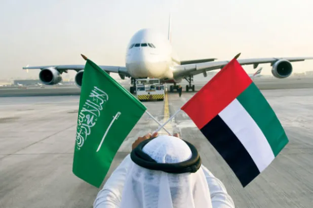 الإمارات تتوشح باللون الأخضر وتشارك السعودية احتفالات اليوم الوطني الـ88