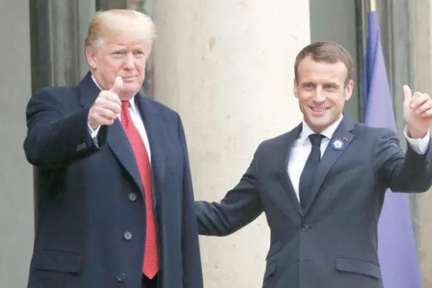 ماكرون وترمب سعيا أمس إلى «ترطيب الأجواء» (أ.ب)