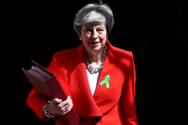 رئيسة الوزراء البريطانية تيريزا ماي (رويترز)