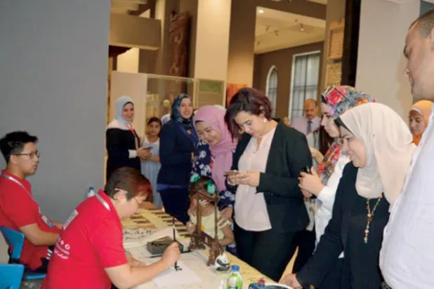 ورشة للخط الصيني مصاحبة لمعرض الصين