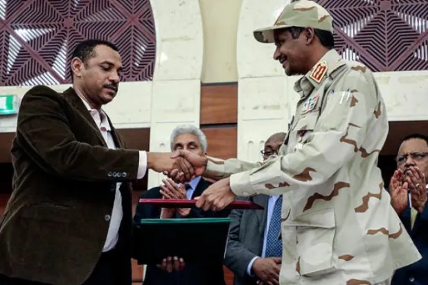 توقيع الاتفاق بالأحرف الأولى في الخرطوم  (أ.ب)