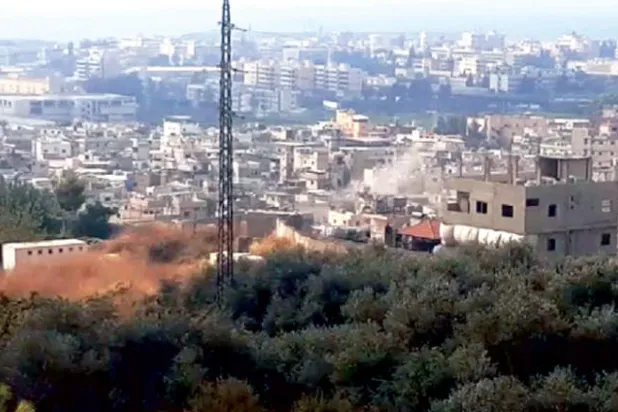 الحريري وعد الفلسطينيين بتجميد قرار وزير العمل