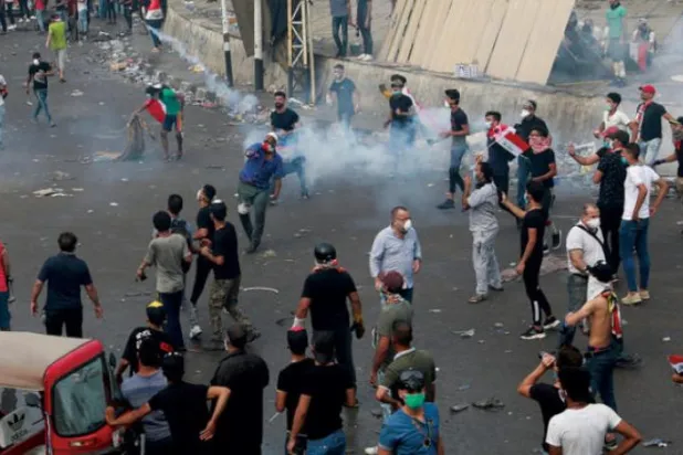 گسترش دامنه اعتراضات عراق و مقررات منع رفت و آمد در بغداد