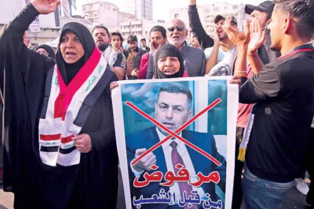 گذشتہ وسطی بغداد کے تحریر اسکوائر میں عیدانی کی وزارت عظمی کے امیدوار کے خلاف مظاہرین کو دیکھا جا سکتا ہے (اے ایف پی)
