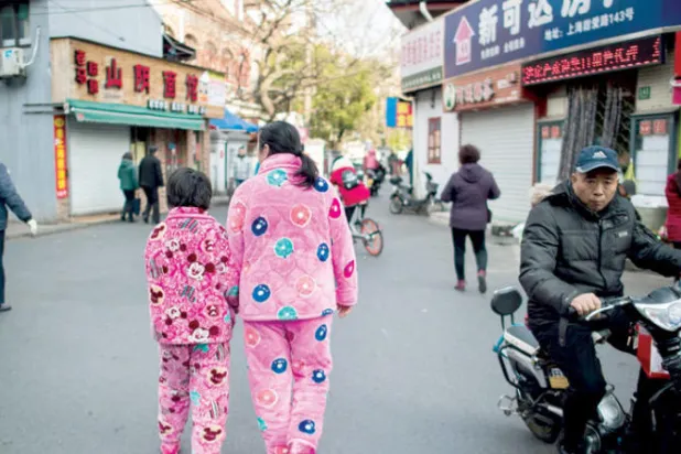 مدينة صينية تشهّر بمرتدي البيجامات بالاستعانة بتقنية التعرف على الوجوه