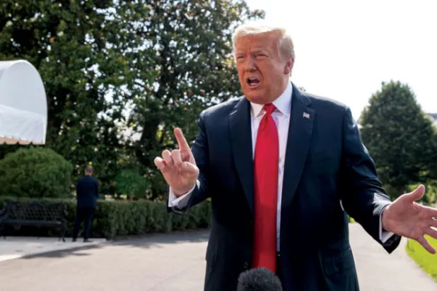 ترمب يدافع عن الاتفاق التجاري مع الصين