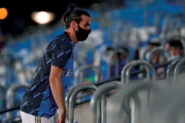 غاريث بيل قضى وقتاً طويلاً على مقاعد البدلاء في ريال مدريد (أ.ف.ب)