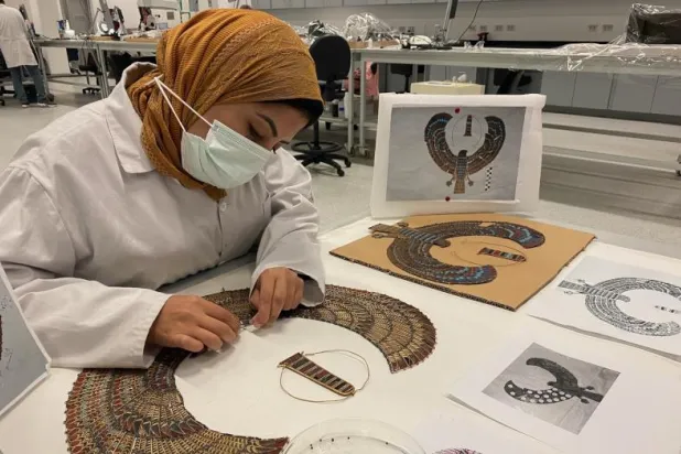 ترميم 55 ألف قطعة أثرية بالمتحف المصري الكبير