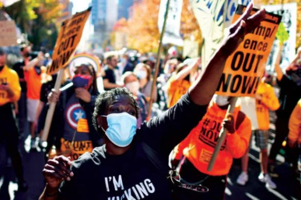 Biden taraftarları dün Philadelphia sokaklarında Biden’ın "zaferini" kutladılar. (Reuters)