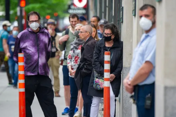 كندا تسجَل 100 ألف إصابة بـ«كورونا» خلال 18 يوماً