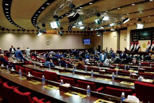 العراق يفاوض «النقد الدولي» لتحديد سعر صرف الدينار