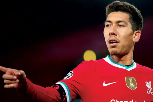 فيرمينو ما زال من ركائز ليفربول رغم تنافس جوتا على مركزه (أ.ب) 