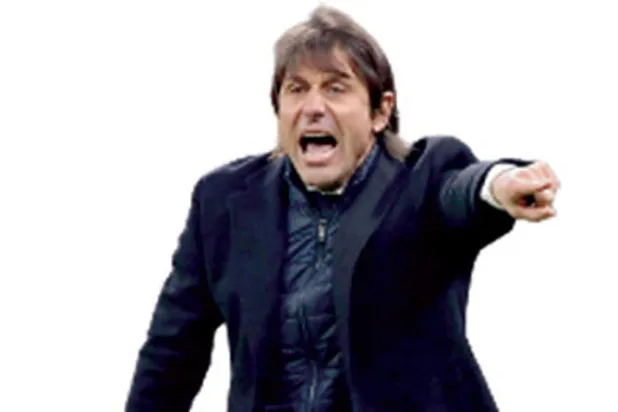 أنطونيو كونتي يريد لحاق إنتر بغريمه التقليدي المتصدر (أ.ف.ب)