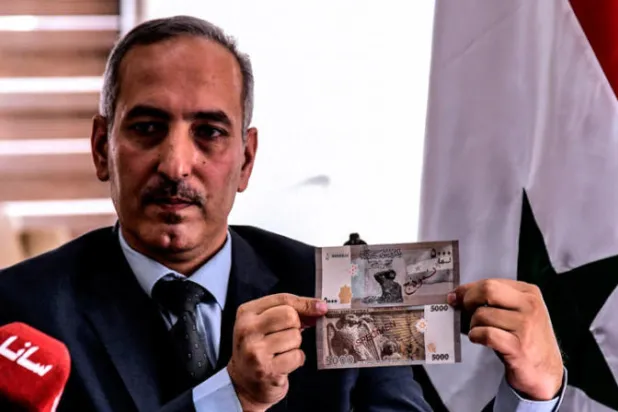 «حكومة» المعارضة تمنع تداول الليرة السورية في إدلب