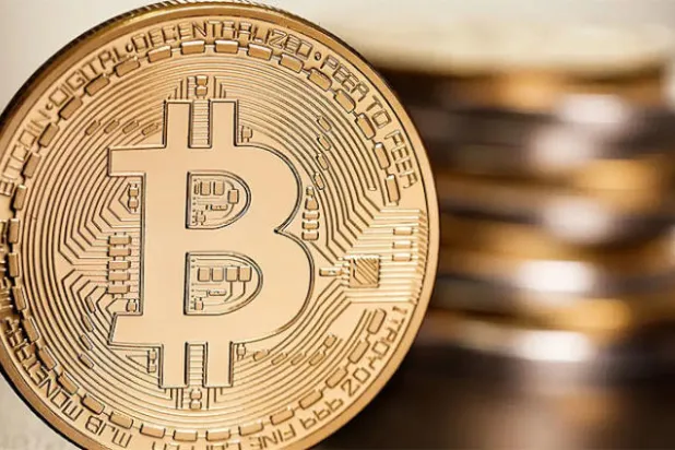 بيتكوين تتخطى 48 ألف دولار