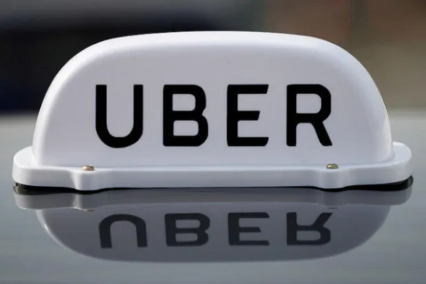 سائقو «أوبر».. عمال رسمياً  في بريطانيا