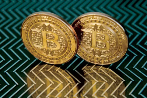 «بتكوين» تتحرك باتجاه 60 ألف دولار