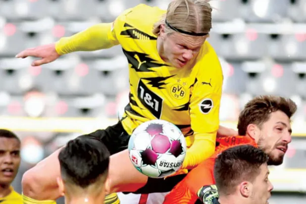 هالاند... إلى أين وبكم تتجه به الأقدار؟ (إ.ب.أ)