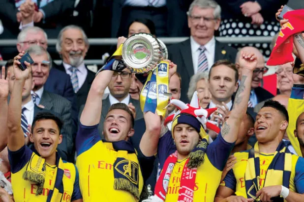 ويلشير خلال احتفال آرسنال بالفوز بكأس إنجلترا عام 2015 (غيتي)
