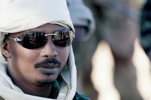 Yaşamını yitiren Çad Cumhurbaşkanı İdris Debi İtno, oğlu Muhammed İdris Debi ve bir askeri lider (2013) (AFP)