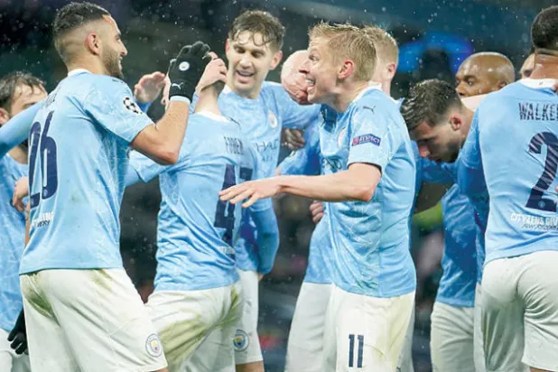 لاعبو مانشستر سيتي وفرحة التأهل لنهائي دوري الأبطال (أ.ب)