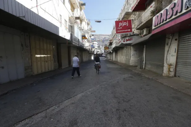 إضراب عام في المناطق الفلسطينية احتجاجاً على «العدوان الإسرائيلي»
