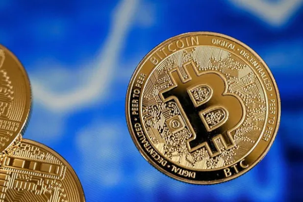 {بتكوين} فوق 50 ألف دولار بدعم من «باي بال»