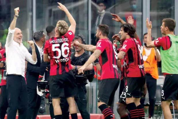 لاعبو ميلان ومدربهم بيولي واثقون من حصد اللقب (إ.ب.أ)