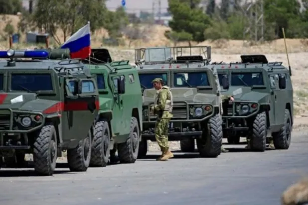 A Russian military patrol in northern Syria. Asharq Al-Awsat