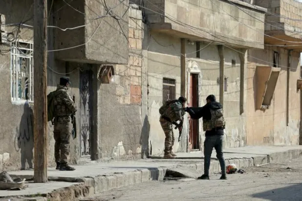 Kurdish security forces deploy in Syria's northern city of Hasakeh on January 22 amid ongoing fighting with the ISIS group following a prison attack. (AFP)