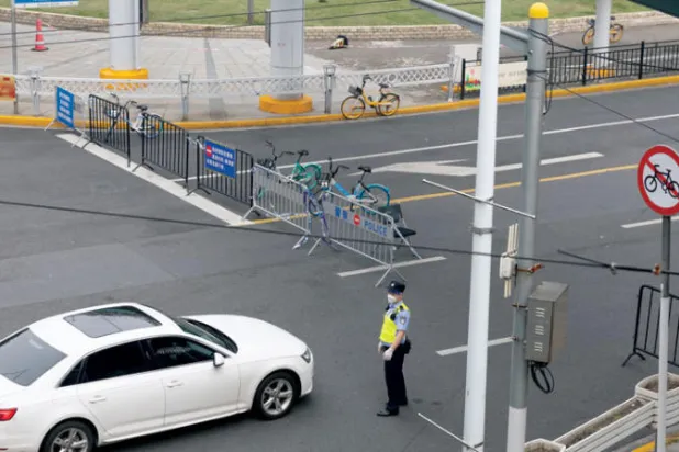 تراجعت أرباح الشركات الصناعية في الصين بأسرع وتيرة في عامين جراء الإغلاق (أ.ب)