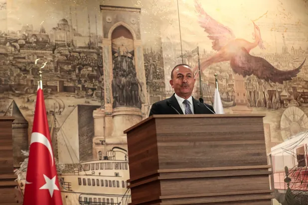 Turkish Foreign Minister Mevlut Cavusoglu speaks during a trilateral foreign ministers press conference with his Romanian and Polish counterparts in Istanbul, Turkey, 27 May 2022. (EPA)