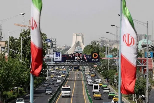 A view shows traffic on Azadi street in Iran's capital Tehran, April 20, 2021. (AFP)
