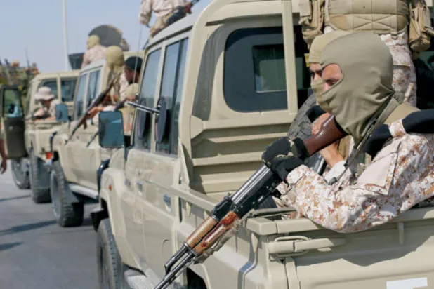 قوات موالية لحكومة الدبيبة تجوب شوارع العاصمة لضمان حفظ الأمن (أ.ب)