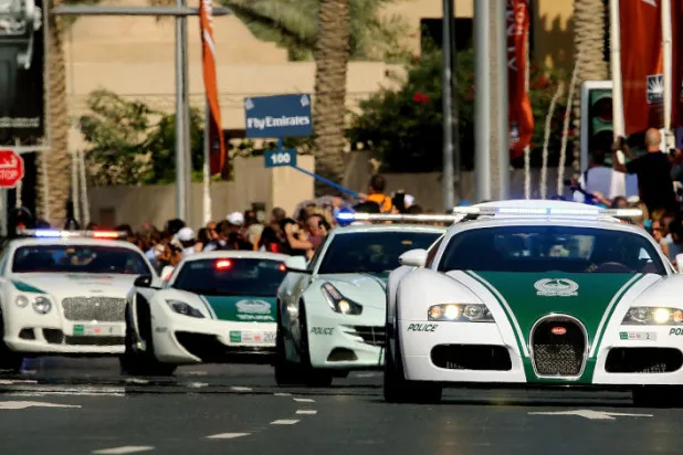 سيارات تابعة لشرطة دبي (أرشيفية - أ.ف.ب)