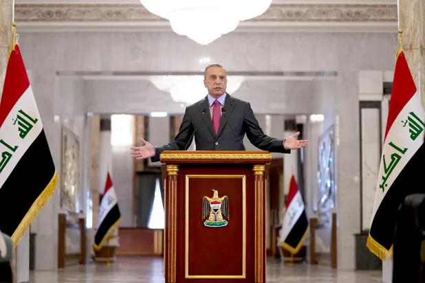 A handout picture released by Iraq's Prime Minister's Media Office on June 7, 2022 shows Prime Minister Mustafa al-Kadhimi giving a press conference at the government headquarters in the capital Baghdad's fortified "Green Zone". (Iraqi Prime Minister’s Press Office/AFP)