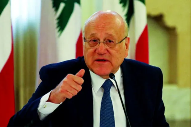 الرئيس نجيب ميقاتي في مؤتمر صحافي في ديسمبر الماضي (رويترز)