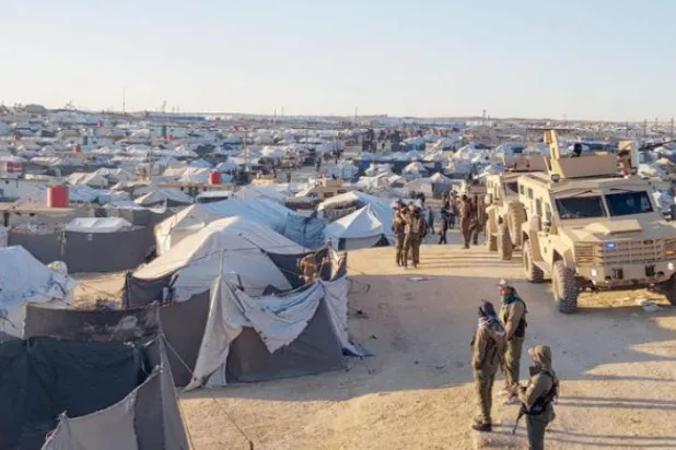 Security forces during a raid in al-Hol camp in March. (Asharq Al-Awsat)