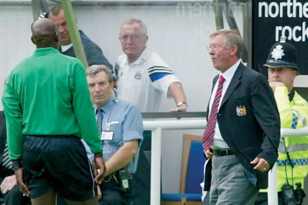 يوريا ريني بجانب فيرغسون مدرب مانشستر يونايتد الأسبق (غيتي)