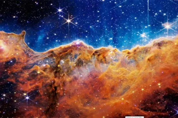 جیمز ویب ٹیلی سکوپ کے ذریعے لی گئی تصویر کو دیکھا جا سکتا ہے جس میں کیرینا نیبولا میں قریبی ستاروں کی تشکیل کے علاقے کے کنارے کو دکھایا گیا ہے (ناسا/ڈی پی اے)