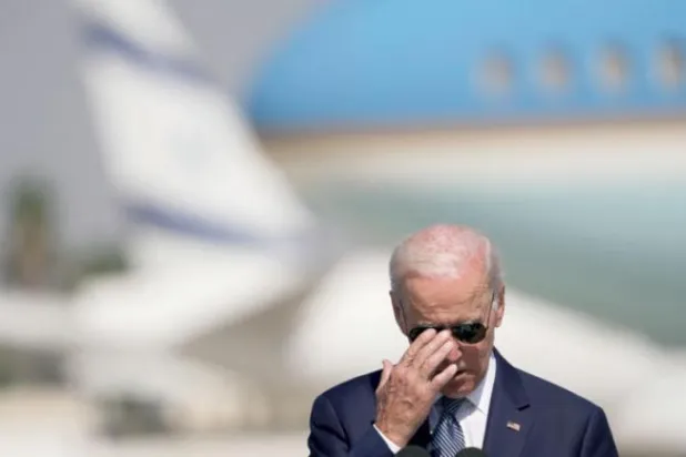 US President Joe Biden delivers a speech after arriving at Ben Gurion Airport (AP)