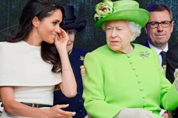 الملكة إليزابيث الثانية ملكة بريطانيا وميغان ماركل دوقة ساسكس (أرشيفية - رويترز)
