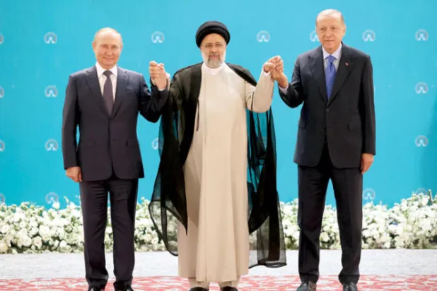 رؤساء روسيا وإيران وتركيا في طهران 19 الشهر الجاري (إ.ب.أ)