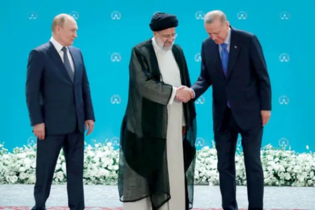 Tahran'da 19 Temmuz'da yapılan Suriye konulu üçlü zirvede Rusya Devlet Başkanı Putin, İran Cumhurbaşkanı Reisi ve Cumhurbaşkanı Erdoğan bir araya geldiler. (AFP)