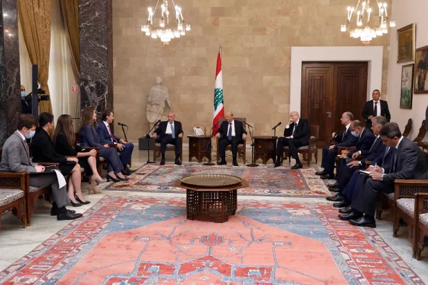 A handout picture provided by the Lebanese photo agency Dalati and Nohra shows Lebanon's President Michel Aoun (C), Prime Minister Najib Mikati (C R), and parliament Speaker Nabih Berri (C L) meeting with US Senior Advisor for Energy Security Amos Hochstein (5th L) and US ambassador Dorothy Shea (4th L) at the presidential palace in Baabda, east of the capital on August 1, 2022. (Dalati & Nohra)