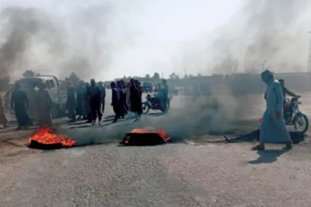 A photo posted on Facebook shows protests in the town of al-Izba. 