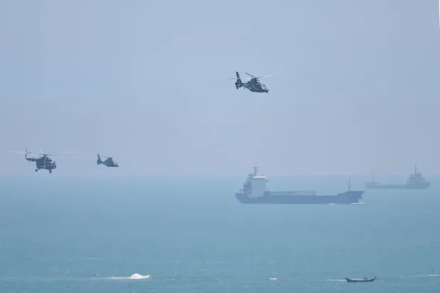 الصين تبدأ بأكبر تدريبات على الإطلاق تنظمها في محيط الجزيرة التي تطالب بها (أ.ف.ب)