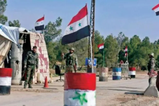 Bölgedeki rejim güçlerine bağlı bir kontrol noktası (Horan Özgürleri Topluluğu)